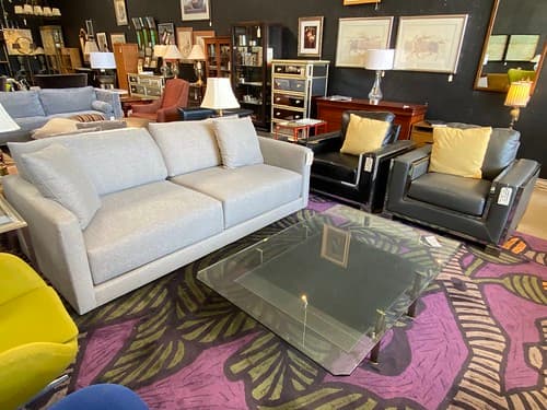 Crate and Barrel Gather Sofa with deep cushions graphite fabric - $899
Industrial Modern Lounge Chair Black with Chrome - $199/ea
Contemporary Glass Top Cocktail Table with Leather Shelf - $399