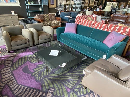 Deco Steamer Arm Sofa Mohair with leather welt down - $1295
Deco Steamer Arm Lounge Chair Chenille with Leather welts down - $299
Contemporary Glass top cocktail table with leather shelf - $399